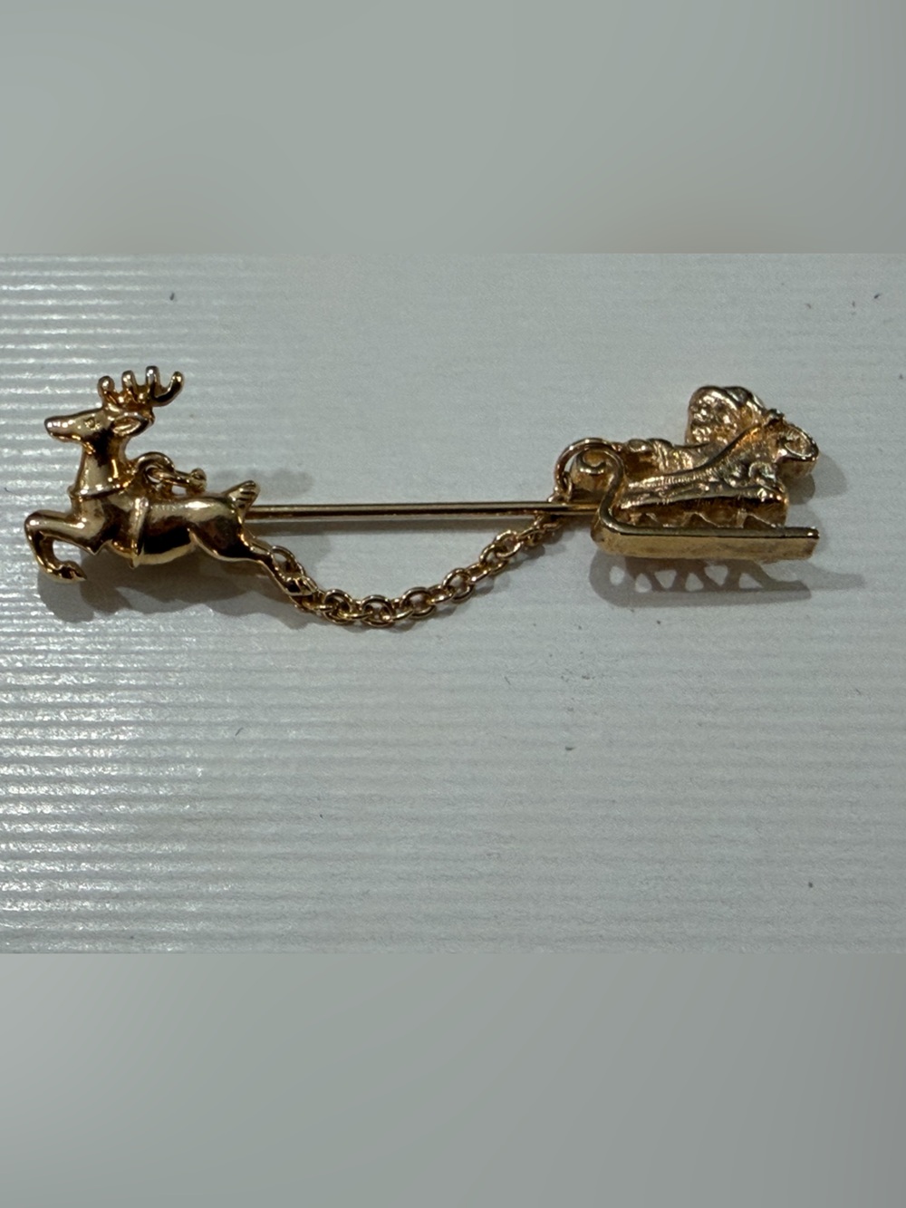 Vintage Avon Santa Reindeer stick pin